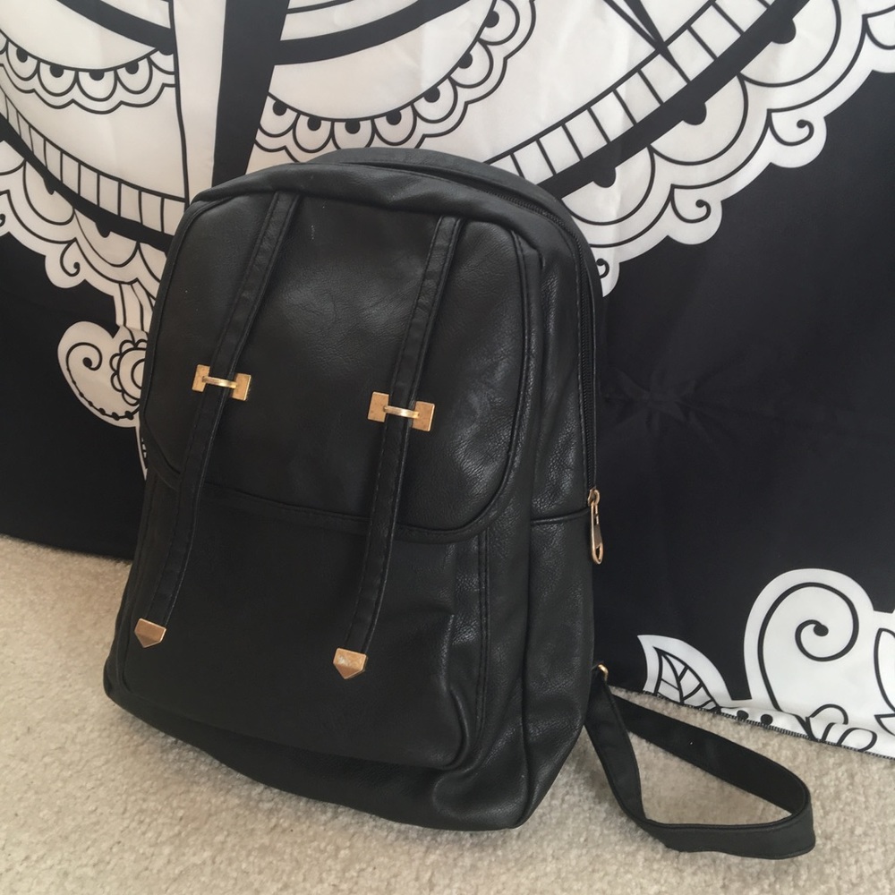 Fashionable mini black backpack!